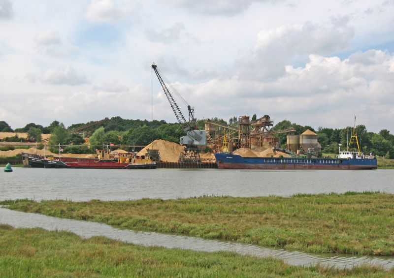  Ballast Quay, Fingringhoe. On the left from the inside are NIGEL PRIOR, BERT PRIOR and MARK PRIOR. On the right is MUNGO.

NIGEL PRIOR is laid up. Built 1966 as ROINA for London & Rochester, sold 2001 to J.J. Prior, Fingringhoe. O.N. 308465.

MUNGO IMO 7920338 has just arrived to load - she sailed overnight for St. Sampsons in the Channel Islands. 
Cat1 Places-->Fingringhoe Cat2 Ships and Boats-->Merchant -->Power