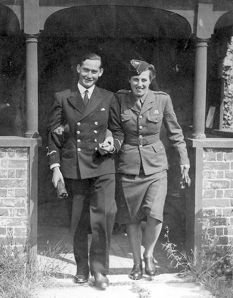  Edith Margaret (Peggy - née Marriage) and Linden Le Marquand leaving the Church of St. Edmund, King and Martyr, East Mersea after their marriage on 17 August 1944. The groom was a sub lieutenant in the RNVR and came from Jersey. 
Cat1 Museum-->DisplayPhotos Cat2 Families-->Lord / Marriage