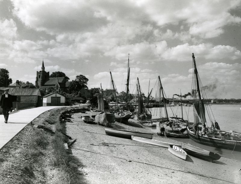  Maldon Hythe on a summer afternoon about 1957.
The smacks include MN21 MAUD and MN23. The barge NELLIE PARKER is on the blocks in the distance. Smoke from Sadd's sawmills drifts across the horizon. 
Cat1 [Not Set] Cat2 Smacks and Bawleys Cat3 Places-->Maldon Cat4 [Display on front screen]