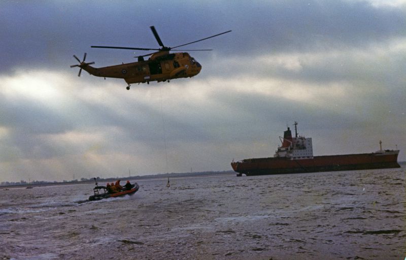  West Mersea Lifeboat exercise with RAF Sea King helicopter. Laid up containership MANCHESTER VANGUARD. 
Cat1 Mersea-->Lifeboat-->Pictures Cat2 Blackwater-->Laid up ships
