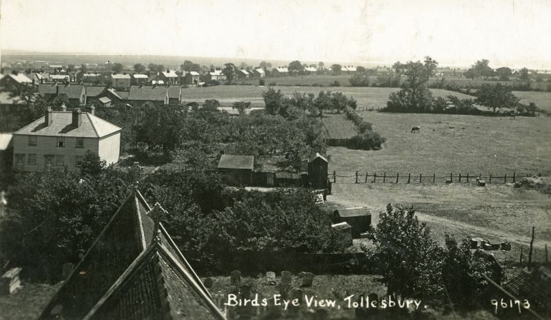  Birds Eye view Tollesbury looking east to Mell Road and West Mersea. Postcard 96173. 
Cat1 Tollesbury-->Road Scenes