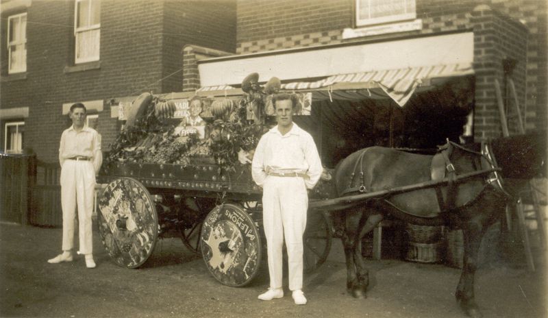  Photograph taken outside the greengrocery shop in Kingsland Road [for the 1930 Regatta parade ?]. The man in front of the horse is Arthur Mills (father of Jenny Mills) and I remember him going around with this greengrocery cart. His parents Mr & Mrs Leonard Mills kept the greengrocery shop which is seen behind the cart. It is now a carpet shop and is in Kingsland Road opposite the doctors ...
Cat1 Mersea-->Shops & Businesses Cat2 Mersea-->Events