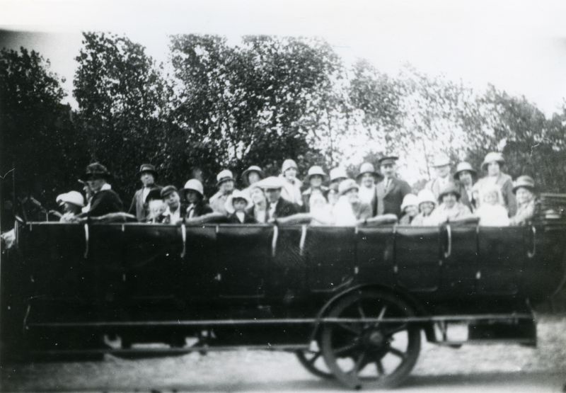  Union Church Sunday School outing. Some of the people known are From Left, Yvonne Mills, Mrs Clarke Mussett, Mrs Hewes (Maisie's mother), Mrs Hartly Brown, Mr & Mrs Sam Moore and Margaret - Blanche Green, Mrs Rudlin, Gracie French and mother.

From Album 2. Accession No. 2016-11-001B 
Cat1 Transport - buses and carriers Cat2 Families-->Rudlin