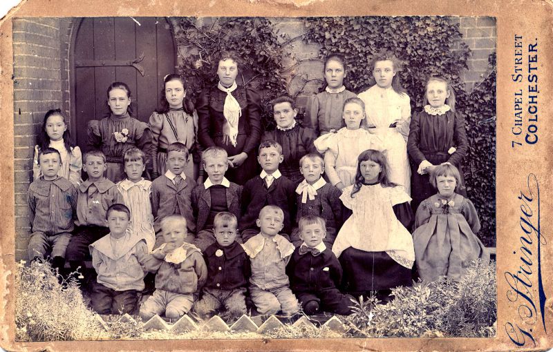  Class photograph at East Mersea School. Thomas Marriage is one of those kneeling in the front row - he was born 26 June 1896 and died in France 5 May 1917. 

Used in Not Just a Name page 101 - see this for more details. 
Cat1 People-->School Cat2 Mersea-->Schools-->Pictures Cat3 Families-->Lord / Marriage