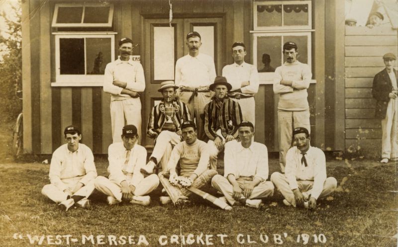 Click to Pause Slide Show


 West Mersea Cricket Club in 1910:

Back Row: 1. Tom Mussett, 2. Bill Mussett, 3. Yorrick Mussett, 4. Becky (Manassa) D'Witt.

Middle Row: 1. Roy Littlehales, 2. S.W. Muttingley.

Front Row: 1. Jack Heard, 2. ?, 3. Dick Haward, 4. Titus Mussett, 5. 'Tuddy' Cook.

Extreme right is Fred Sales, father of Reg [Owen Fletcher].

From Two Hundred Not Out, page 15. 
Cat1 People-->Sport