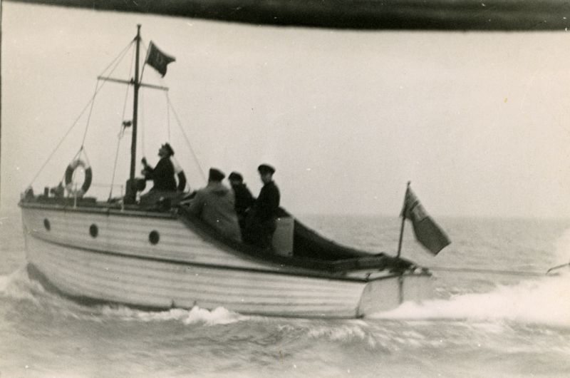  Boxing Day 1949. Wormell's boat with Mr Wormell at the wheel. He was a garage owner from Sudbury.[Ron Green and John Milgate] 
Cat1 Families-->Pullen Cat2 Ships and Boats-->Launches