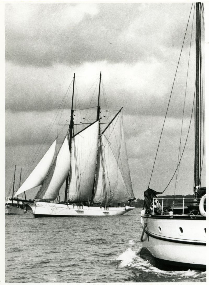  Schooner TAMESIS. The old steamer and sailing ship type of ornamental bow for many years before 1936 seen sailing on the River Colne. [DW].

The 140 ton schooner yacht TAMESIS weighing anchor in the Colne, 1933. The cable is being hove short and the staysail is backed to stop her forging ahead in the light breeze under the foresail (the sail between the masts in a two masted gaff rigged ...
Cat1 Yachts and yachting-->Sail-->Larger Cat2 Yachts and yachting-->Steam Cat3 Yachts and yachting-->Motor Cat4 Places-->Colne