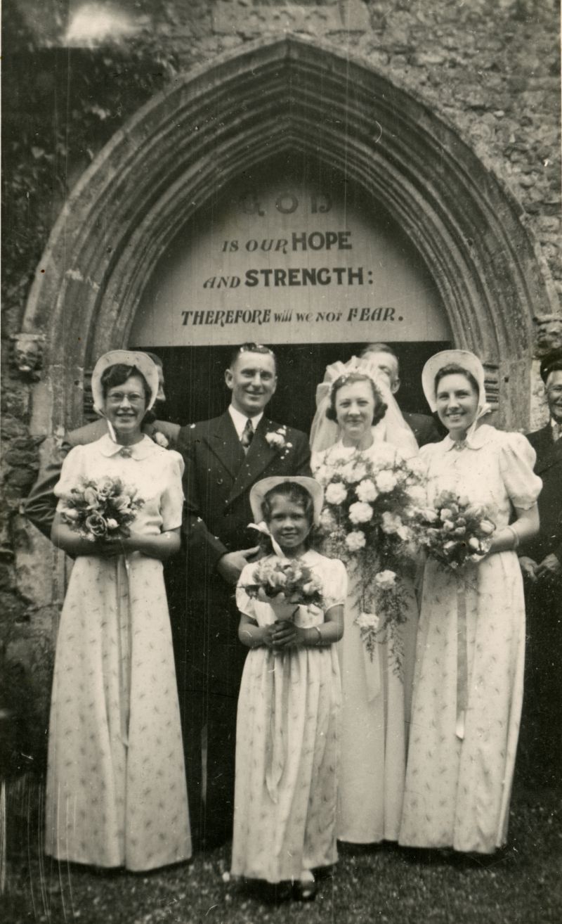 Wedding of Betty Hewes and Tom Pullen at West Mersea Parish Church. Barbara Pullen, Daphne Crick, little Joy Vince.

Elizabeth Lilian Hewes and Thomas Gerald Pullen married West Mersea Parish Church, 28 June 1941. 
Cat1 Families-->Pullen Cat2 Families-->Hewes
