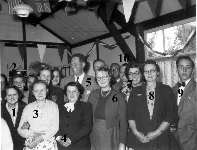  Coronation Party. 1 Mrs Bill Green (Skidger Green's mother) 2. Mrs John Dixon 3 Mrs Ike King 4 Mrs Lane 5 Sgt Tom Waylett 6 ? 7 Mrs Hadley 8 ? 9. Robin Garton, 10. Fred Wass.

No 9 is probably Robin Garton. Family moved to Clacton but used to live at the bottom of Kingsland Road. He played the drums and had his own band [RG].

Picture taken in the Fountain Hall.

See  ...
Cat1 Mersea-->Events