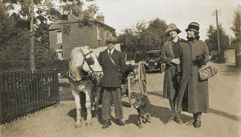  Clem Smith, Edith and Harriett, on High Street North. The Smith family shop is behind the fence on the left on the corner of Mersea Avenue.
Edith Smith née Head was Clem's mother and Harriett her sister. 
Cat1 Families-->Smith