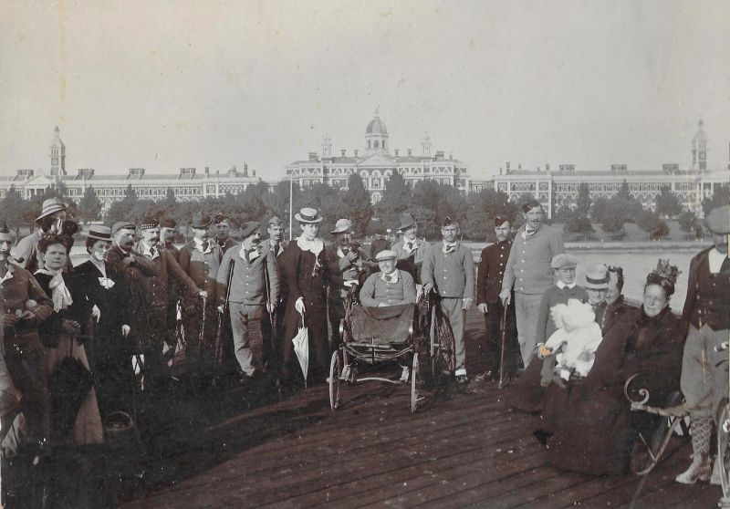  Edith Smith née Head towards the right with a baby on her lap. George Saunders Smith is standing behind the baby. Fanny Head née Saunders and Emma Smith née Beaumont to the right of Edith.

Behind George Saunders Smith is Fanny or Emma's Uncle Liberty (with a walking stick).


In the background is the Royal Victoria Hospital, Netley, on Southampton Water. George's ...
Cat1 Families-->Smith