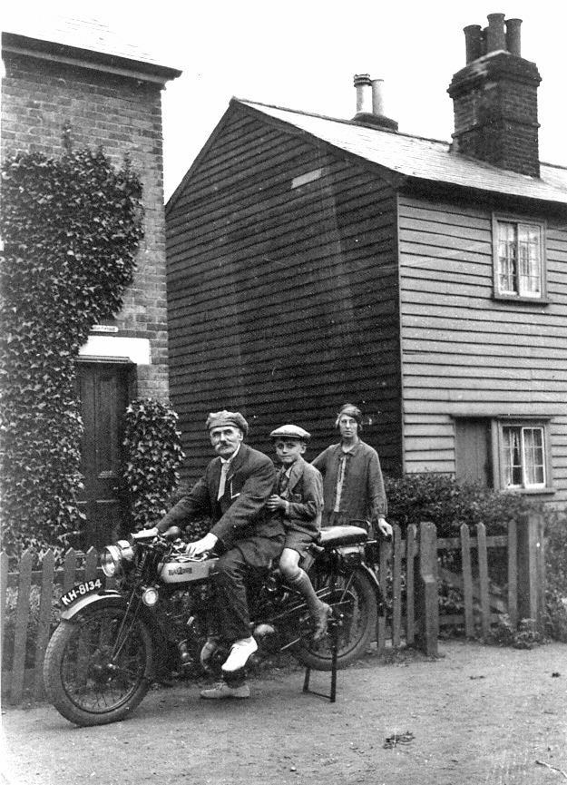  Raleigh Motor bike KH8134. Ernest Alfred Everett outside Ivy Villa Churchfields. Vivian Downsworth on back about 1929.

In 1931, Ernest Everett was living at Beaulah Cottage in Churchfields.

KH8134 was registered in Hull c1928. 
Cat1 People-->Other Cat2 Mersea-->Road Scenes