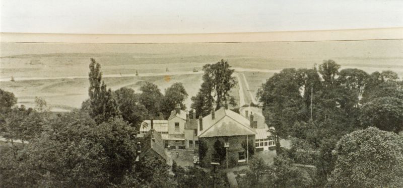  Orleans Cottage from the church tower. View looking across Kings Hard to the boats moored in the creek. This creek no longer exists. 
Cat1 Mersea-->Buildings