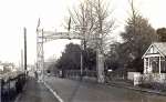 20. ID BJ20_009 1937 Foresters Arch over Barfield Road. Coronation of King George VI.
View looking east with Barfield Road Cemetery on the right.
Cat1 Mersea-->Events Cat2 Mersea-->Road Scenes