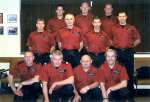 13. ID DIS2006_FIR_N16 West Mersea Fire Brigade - crew of 2004.
Left to right Back row Robert Dean, lan Moncur, Nigel Balls 
Middle row Mick James, Maurice Board, Gary ...
Cat1 Mersea-->Fire Brigade Cat2 Museum-->DisplayPhotos Cat3 Museum-->DisplayPhotos