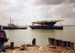 887. ID DEP_HIS_035 HISPANIA leaving Mersea for restoration. Tug HOFLAND.
Cat1 Yachts and yachting-->Sail-->Larger Cat2 Mersea-->Houseboats Cat3 Mersea-->Houseboats