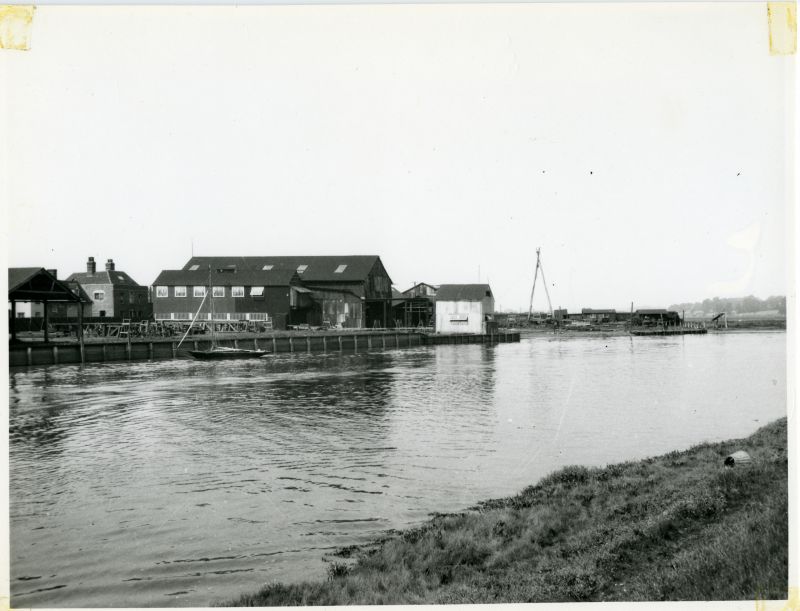 Click to Pause Slide Show


 The Upper Yard of the Rowhedge Ironworks Company shipyard in 1932. From left - small plate shop; fitting out quay; offices in background; sawmill with joiners shop above; 'Big Shed'; lean-to roof with presses; coppersmiths shop (white); sheer legs. All berths empty.

There were no orders at the time of slump and only a few key staff were retained. At the end of the year an order for the ...
Cat1 Ship and boat building, sailmaking Cat2 Places-->Rowhedge