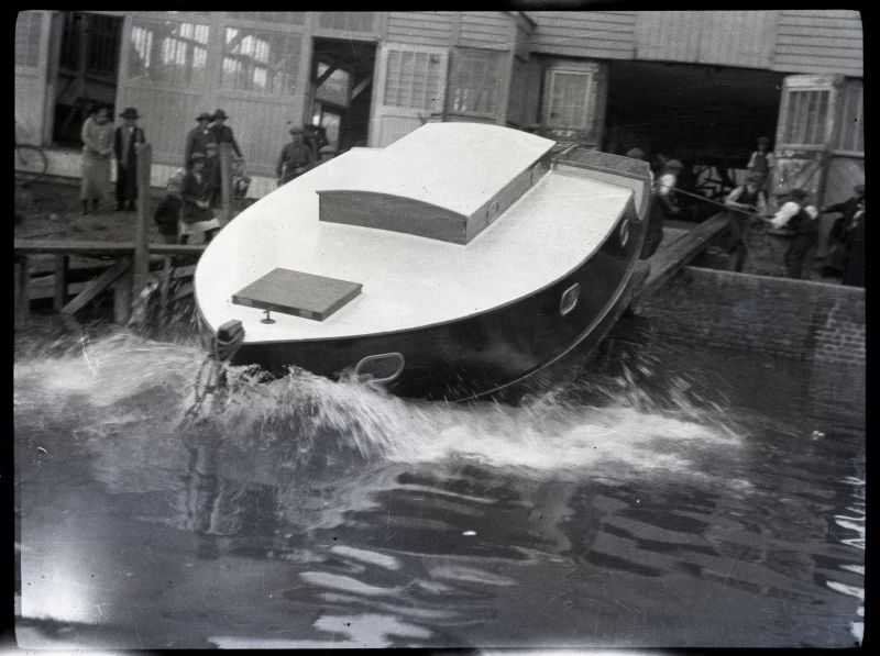ID BF73_001_149_017 Launch of wooden cruiser at Husk's Boat Builders, Wivenhoe.
<br>From a negative