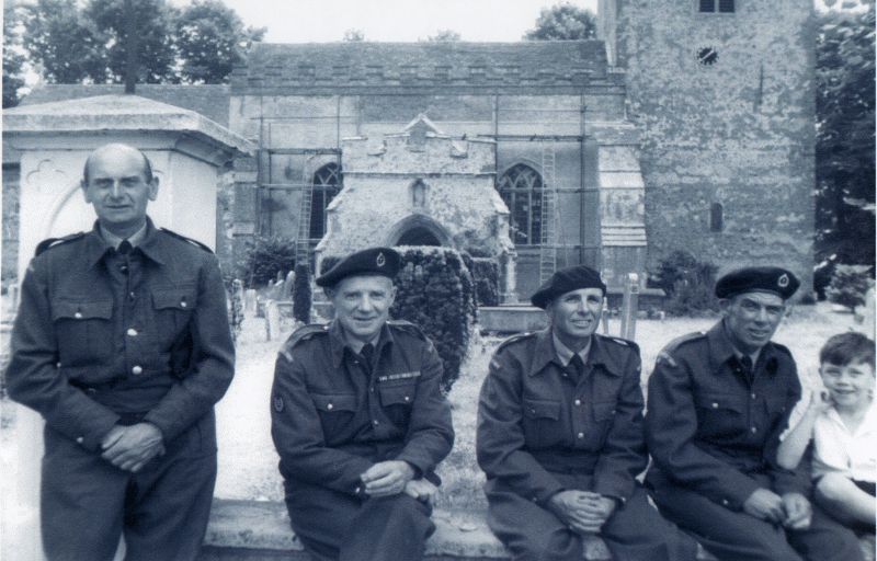  Members of the Royal Observer Corps on the church wall.

L-R Ernie Woods, Sid Stoker, Jack Mole, Dick Haward and Richard Haward (not a member!).

Thought to be late 1940s. 
Cat1 War-->World War 2 Cat2 Mersea-->Buildings