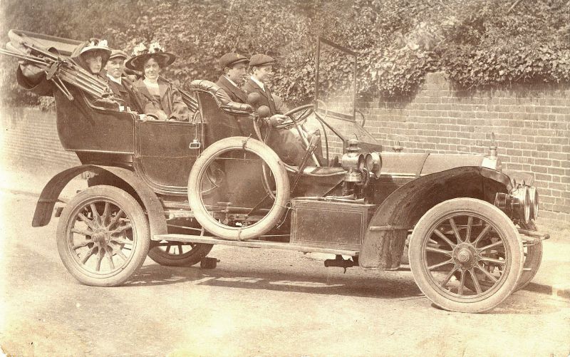 This wonderful horseless carriage, owned we believe by Mr. Roy Littlehale is about to take Arthur Hempstead and his wife the former Isabella May Gardner to their reception or off on honeymoon after their marriage in 1909. The brakes must have been doubtful as a brick has been placed under the back wheel to make sure the car doesn't take off while the photographer is at work.

Used in the 2009 ...
Cat1 Museum-->DisplayPhotos Cat2 Transport - buses and carriers