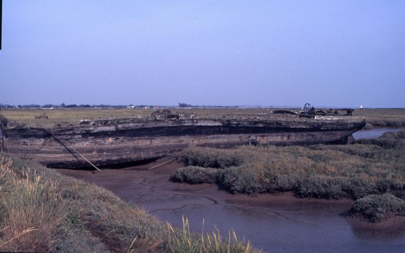  River Blackwater from source to sea. Northey Island and the remains of the barge MISTLEY, Official No. 91336, built J. & H. Cann, Harwich, 1891. 
Cat1 Blackwater-->Views Cat2 Barges-->Pictures