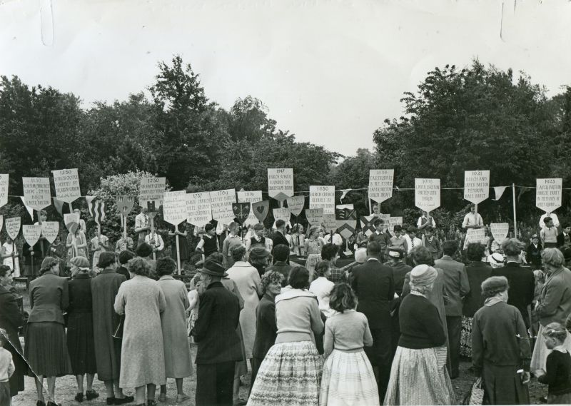  Birch School. History of the village pageant. Includes 1957 School Enlarged shield, so date is 1957 or later.

First row of shields, 5th girl is Marion Bowtle. 
Cat1 Birch-->School