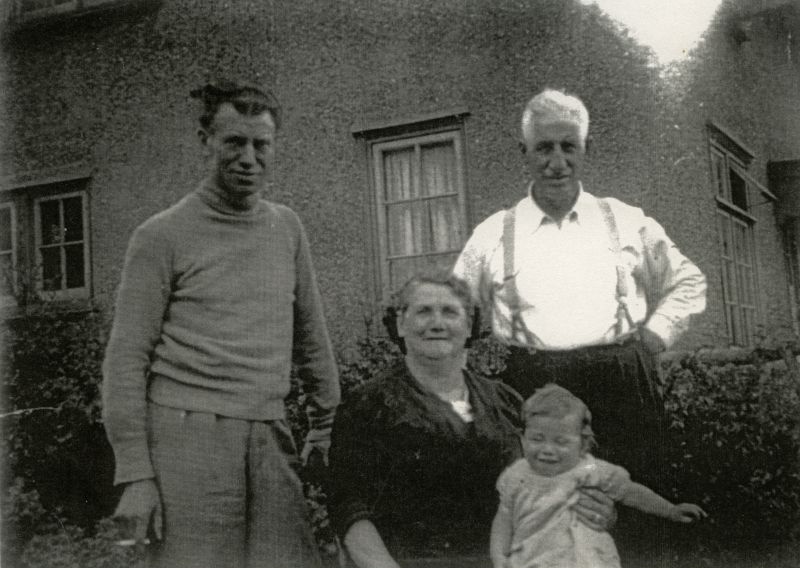  L-R Gordon Mussett, the Heywoods his wife's parents, and lower, Nick Mussett, son of Gordon and Cath Mussett.

From David Mussett photo album. 
Cat1 Families-->Mussett