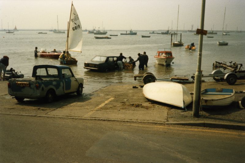  High tide at The Hard - rescuing a car. 
Cat1 Mersea-->Old City & the Hard Cat2 Disasters and Mishaps-->on Land