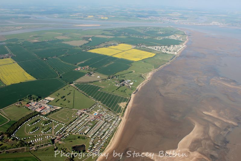 Mersea Island looking northeast. Waldegraves caravan park is lower left.

Part of a collection of aerial views of Mersea taken by Stacey Belbin. If you are interested in purchasing any of these photographs, please contact Stacey at ladygraceboat.trips @ gmail.com 
Cat1 Aerial Views-->Mersea