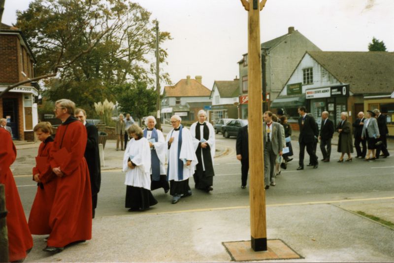  Dedication of West Mersea Village Sign - procession from the Parish Church. Yorick Road in the background. In robes L-R Jill Newham, David Seed, Tom Millatt and Revd. John Swallow. 
Cat1 Mersea-->Events