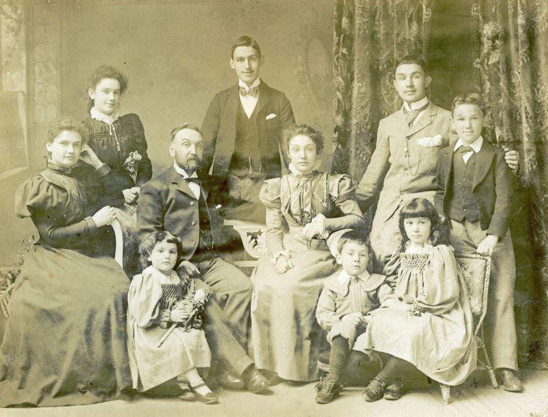 Click to Pause Slide Show


 Samuel Cant White in family group c1897.

Back row 1. May 2. Frederick 3. Clifford 

Middle row 4. Grace 5. Samuel Cant 6. Katie 7. Horace 

Front row 8. Dorothy 9. Claude 10. Elsie

Samuel's wife Martha died in 1894.

Framed photograph by William Gill, Sir Isaacs Walk, Colchester. 
Cat1 Families-->White Cat2 Museum-->DisplayPhotos