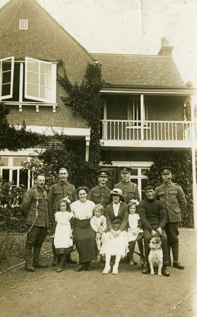  Army at Port Bower on Yorick Road during WW1. L-R Gert French, Ethel French, Billy French, Alice Hewes, Norah French (née Gant) Bert French. 

Mr & Mrs French acted as housekeepers to Army billeted in the house during WW1.

Alice Hewes ran John Hewes shop after his death. Bert French was an oysterman and yachtsman - he served on Sir T. Lipton's yacht SHAMROCK. 
Cat1 War-->World War 1 Cat2 Families-->Hewes Cat3 Families-->French