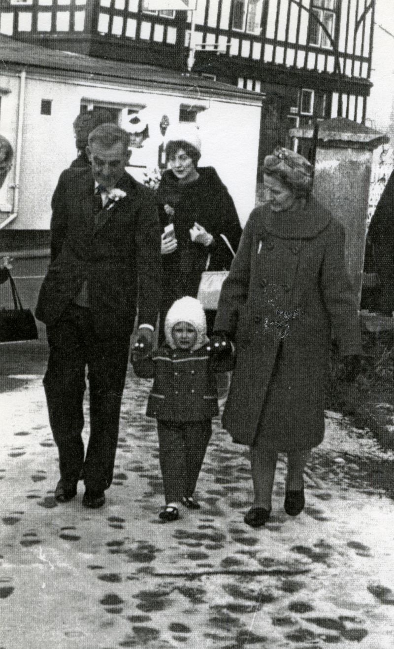  Church path in the snow. Lewis 'Pinky' Hewes, Marjorie Hewes née Badham, Violet Hewes.

From Album 5. 
Cat1 Families-->Hewes