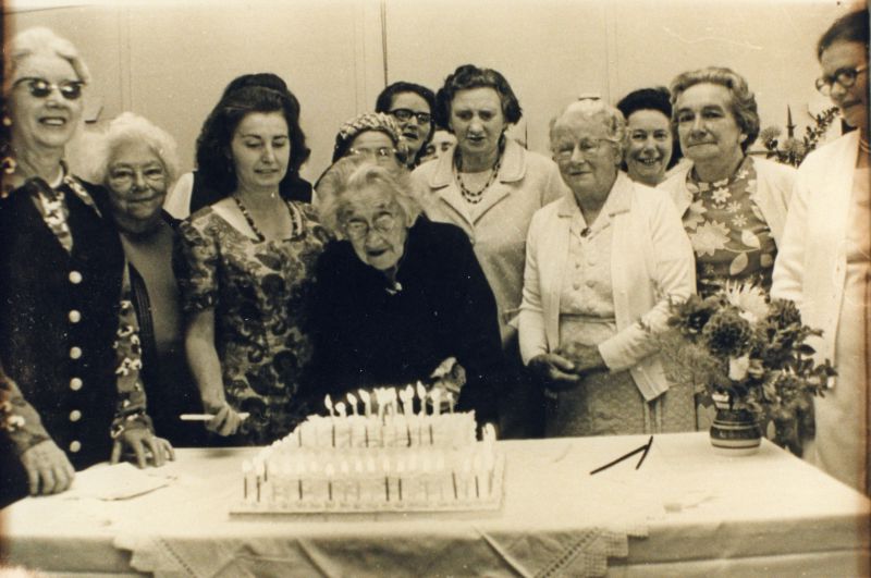  Centenarian Birthday of Mrs Annie Green

L-R 1. Mrs Cansdale or Mrs Taylor, 2. Mrs Annie Walker, School teacher, 3. Joyce or Joan Warner, 4. Hidden, 5. Annie Green, 6. Mrs Ian Heddle - behind Annie - (Ian was Director of Huttons), 7. Pat Cole née Bond, sister to Clifford & Lewis Bond, 8. Margery Bambridge, 9. Violet Bond (Mrs Leslie Bond) (Les was gardener at Birch Hall), 10. Mrs Alice ...
Cat1 Birch-->People