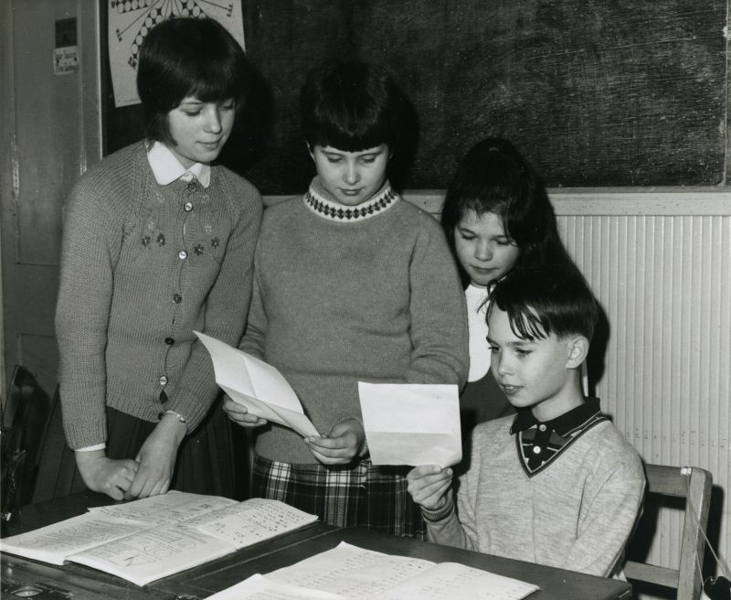  Birch School, 1960s?

L-R 1. Carol Ratcliffe, 2. Shirley Coe, 3. Linda Hilden, 4. Tim Hewett. The children had received a reply from Downing Street after they sent letters to the Prime Minister, Edward Heath.

Names from Jeanette Baker, who was sister of the late Tim Hewett. Tim is buried in Birch churchyard.

Essex County Standard photograph. 
Cat1 Birch-->School