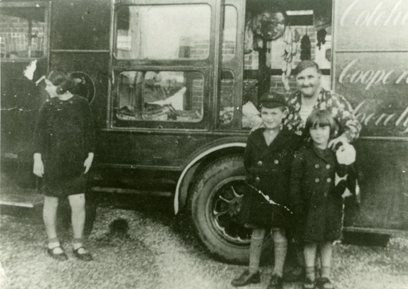  Co-op butchers delivery van at Hardys Green, Birch, 1939 or 1940.

L-R 1. Alice Wayman ?, 2. Roy Hattersley, 3. Mrs Birtha Smith, 4. Olive Hattesley. Roy and Olive were evacuees. 
Cat1 Birch-->Hardy's Green Cat2 War-->World War 2 Cat3 Birch-->People