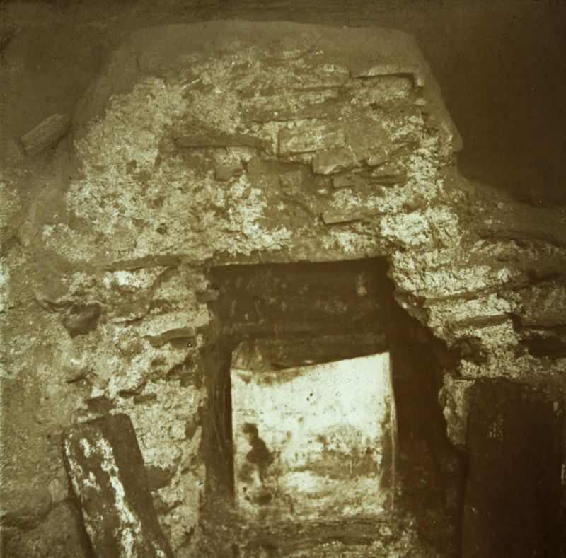  Mersea Barrow - magic lantern slide from S. Hazzledine Warren collection at Essex Field Club.

Lead box and glass urn in the burial chamber. 
Cat1 Mersea-->Barrow-->Pictures