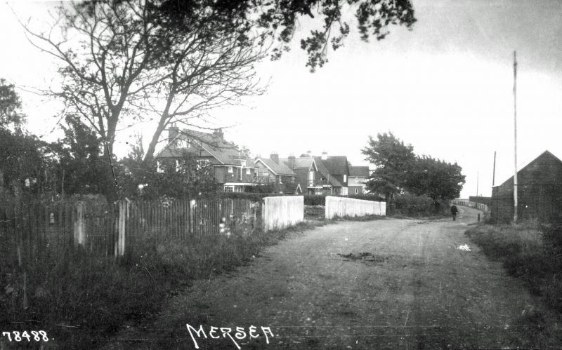  Coast Road, Hempstead's shed on the right. Postcard 78488 
Cat1 Mersea-->Road Scenes
