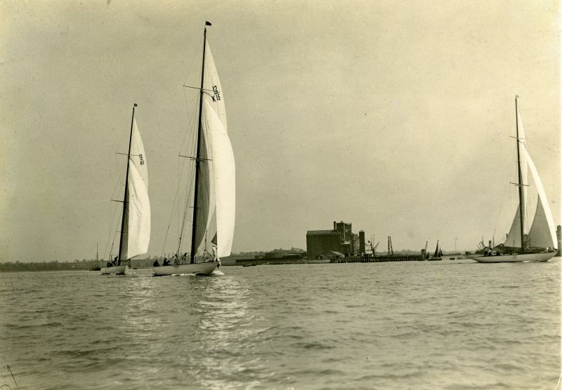 Click to Pause Slide Show


 12 metres stand out from Harwich harbour, past the grain mills of Felixstowe Dock. This photograph was taken at the Royal Harwich Yacht Club Regatta of either 1928, 1929 or 1930. K.15, in the foreground, is Thomas Sopwith's MOUETTE, then the most successful 12 metre, sailed by her owner and manned by Captain George Williams of Hamble, Hampshire, with a white clad, Solent crew. MOUETTE was ...
Cat1 Yachts and yachting-->Sail-->Larger Cat2 Places-->Harwich