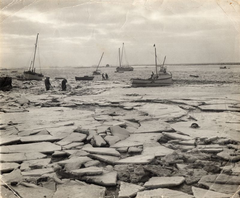  Ice at Mersea Hard in the bad winter of 1963. CK61 to the left.

Accession No. P1123-3. 
Cat1 Mersea-->Old City & the Hard Cat2 Weather