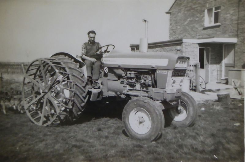  Bernie Ratcliffe. Ford tractor KOO468C. Farming at New Hall Farm, Little Wigborough. 
Cat1 Places-->Wigborough Cat2 Farming