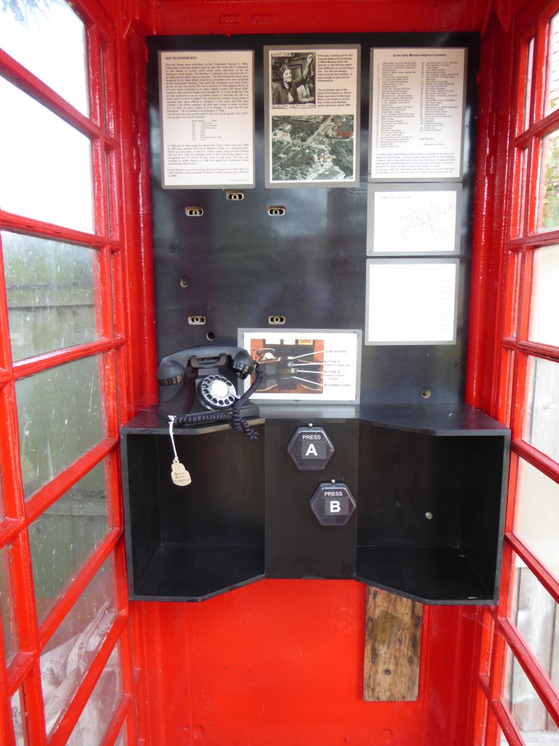  Inside our Telephone Box. Press Button A to connect or Press Button B to get your money back.

Top right is a list of early telephone numbers, starting with West Mersea 1. See  ...
Cat1 Museum-->Artefacts and Contents Cat2 Museum-->Publicity