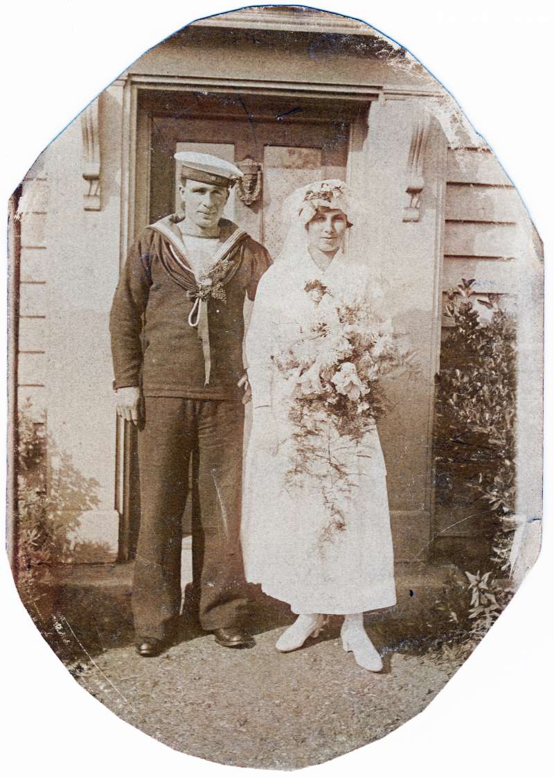  Archibald Percy Green and Lucy Sarah Hoy. Photograph taken outside Moss Cottage, Queens Corner after their marriage at West Mersea Parish Church.

Archibald Percy Green died when RFA INDUSTRY was lost 18 October 1918 - see Not Just a Name page 167. 
Cat1 Families-->Hoy Cat2 Families-->Green