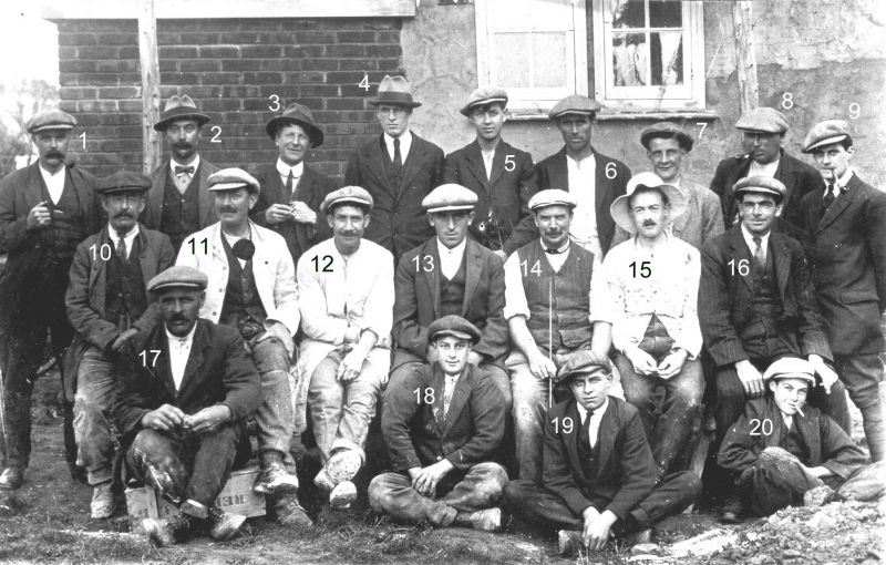  Clifford White men who built the Council Houses in Barfield Road c1920. Names as given by Mary Stevens are

1. Jack Spurgeon 2. Mr Freeman 3. Claud Dymock 4. Mr Strong 5. Ernie Benns 6. Tom Cudmore 7. Horrie Whiting 8. Tim Mole 9. Cyril Rudlin 

10. Mr Rout 11.'Pincher' Fincham 12. Unknown 13. 'Tricky' Clarence Cudmore 14. Jim Garrard 15. Mr Summers 16. Jim Groom 

17. Mr Barrett 18. ...
Cat1 Mersea-->Shops & Businesses