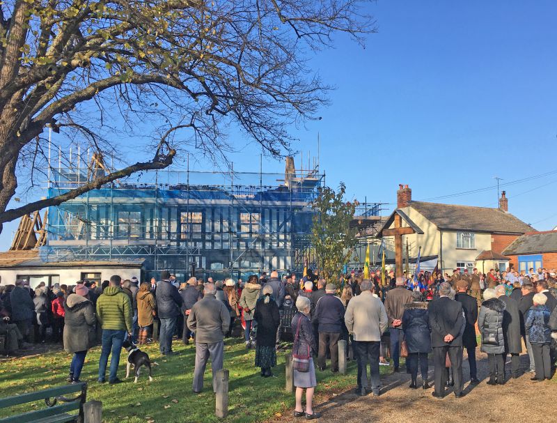  Remembrance Sunday celebration at West Mersea War Memorial.

In the background, the White Hart is undergoing major restoration. 
Cat1 Mersea-->Events Cat2 Mersea-->Buildings Cat3 Mersea-->Pubs