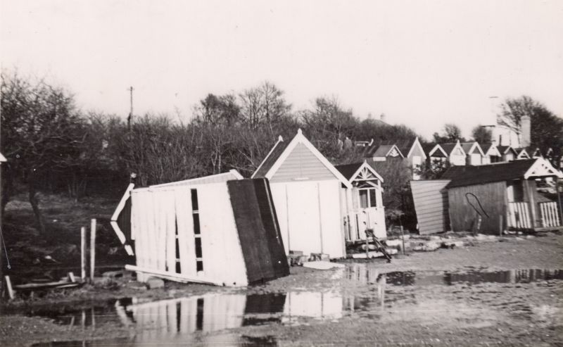  Beach Huts at West Mersea after the 1953 Flood. The western end of the huts, by the corner of Broomhills Road. 
Cat1 Disasters and Mishaps-->on Land Cat2 Mersea-->Beach