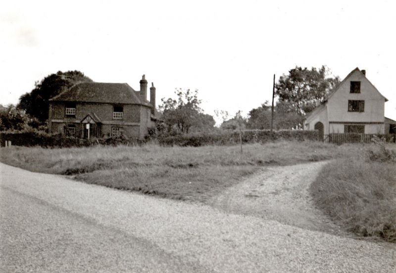  From Deeds of Sleyes, Peldon.

Photograph probably taken 1937 when property was for sale. Sleyes is on the left - it was called The Ramblers at the time. The church is off to the right. 
Cat1 Places-->Peldon-->Buildings