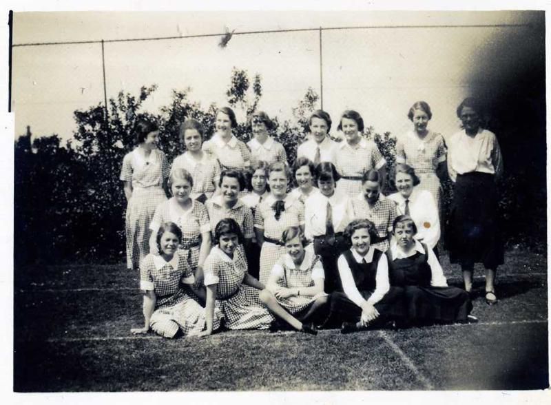  High School, Colchester. Betty Hewes, seated on ground, rhside. 
Cat1 Families-->Hewes Cat2 People-->Other