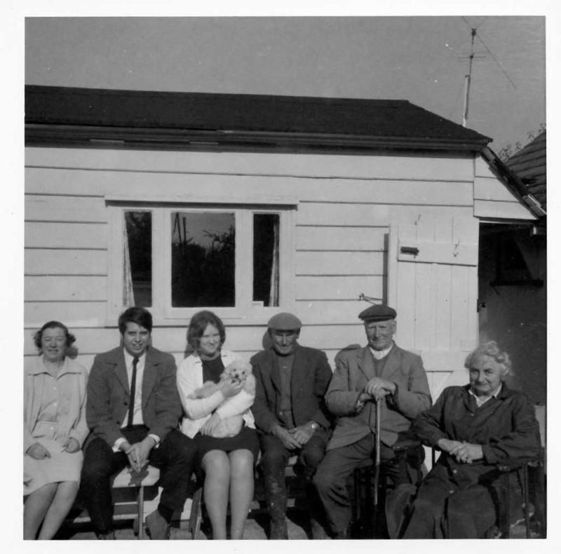  Betty Hewes, Trevor Hayes, Gill Hayes, Hec Pullen, Fred & Tora outside Fred and Tora's house, West Mersea. 
Cat1 Families-->Hewes Cat2 Families-->Pullen