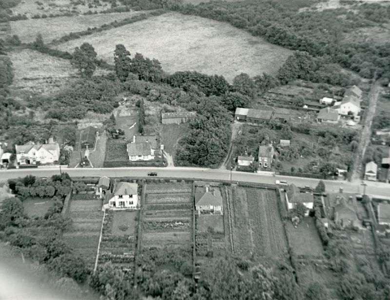  Jack Botham aerial photograph 627. Kingsland Road. W.I. Hall on the left with Port Arthur to the right of it. Rainbow Road near right edge. A little further to the right is The Cabin and then Rainbow Cottage. In the centre, Elmwood Drive now head north from Kingsland Road and curves round behind the WI Hall.

The bungalow in the centre on the west (lower) side of Kingsland Road was built by ...
Cat1 Aerial Views-->Mersea